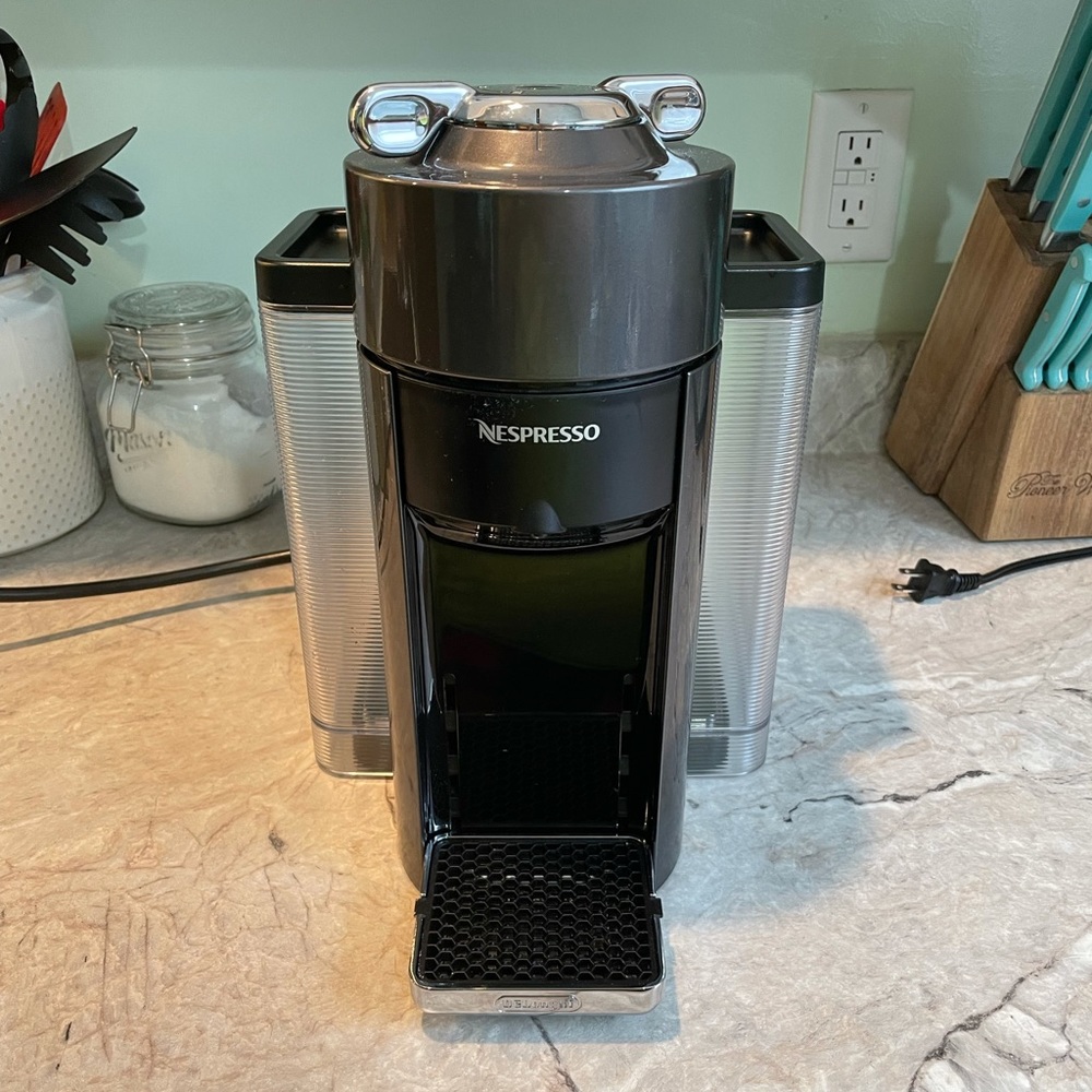 Nespresso machine, milk frother and pods!